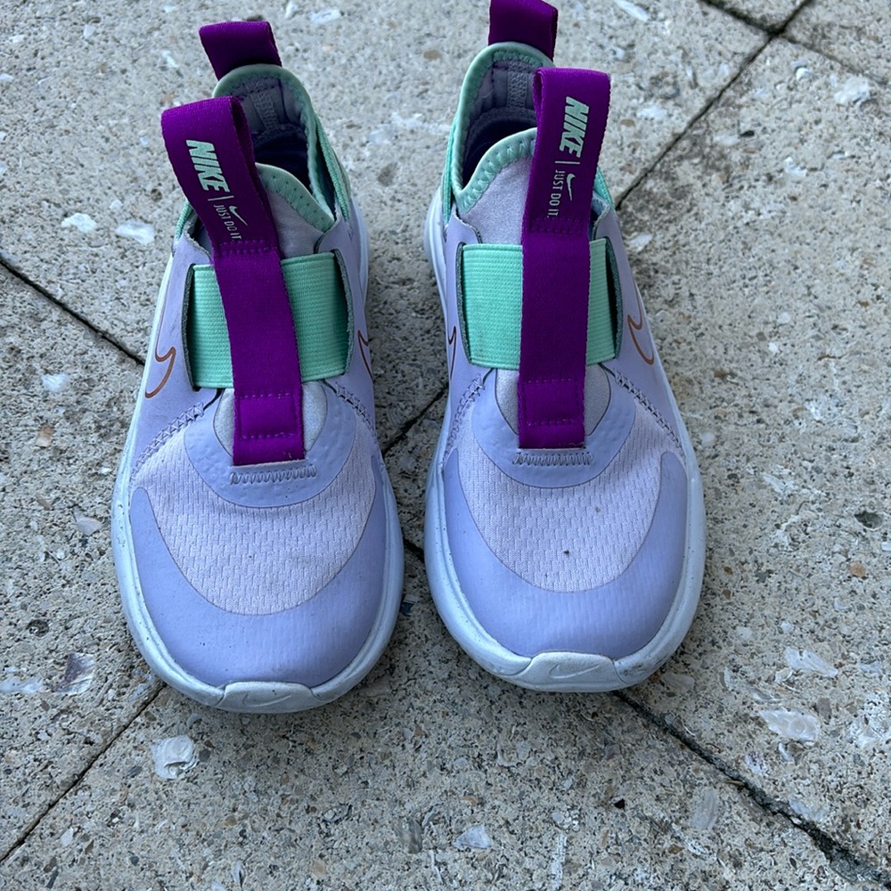 Girls Nikes slip on very lightly worn